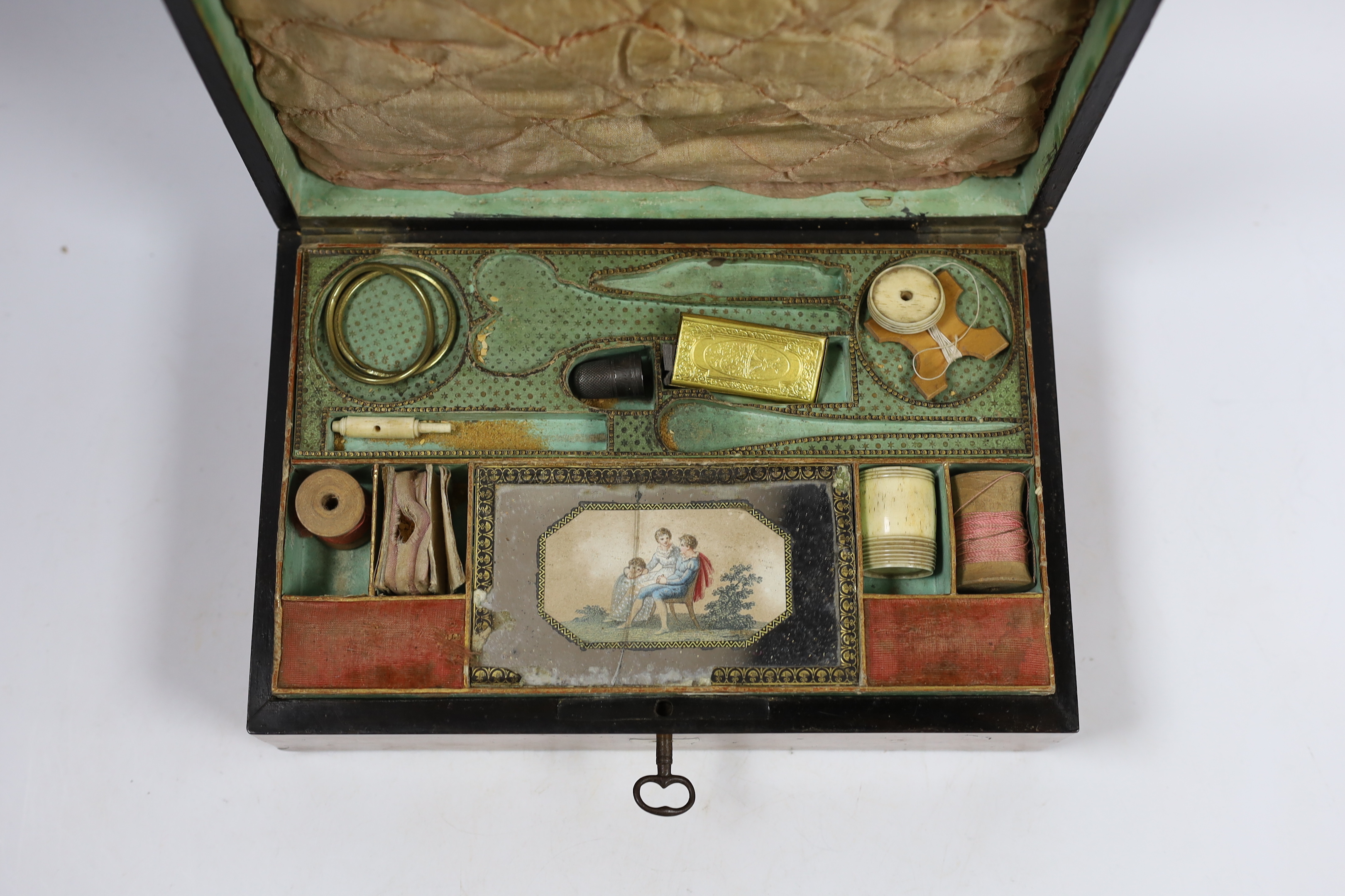 An early 19th century French bird's-eye maple and a walnut sewing box containing some sewing accessories, 24 x 16 x 8cm